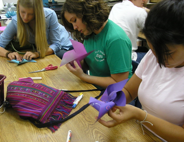 kate julianne and susan making pinwheels