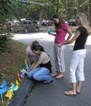 Girls planting their pinwheels